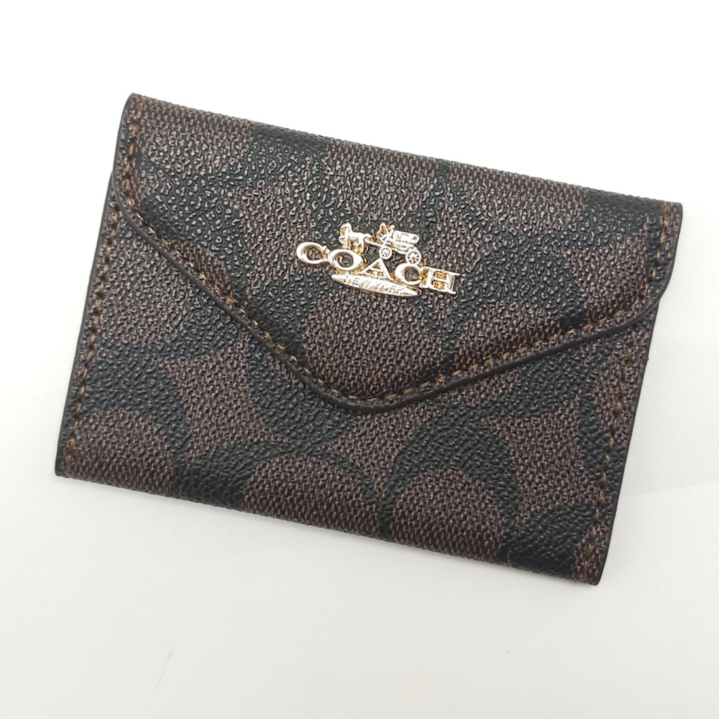 Monedero de Marca RP COACH Cada Uno