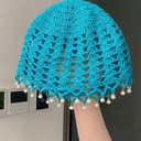 Casquete con perlas alrededor del borde