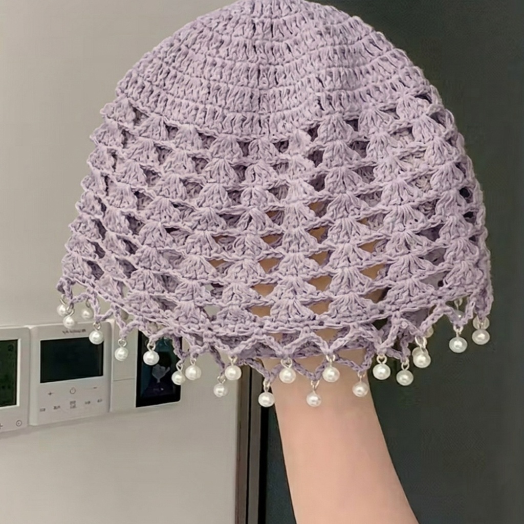 Casquete con perlas alrededor del borde