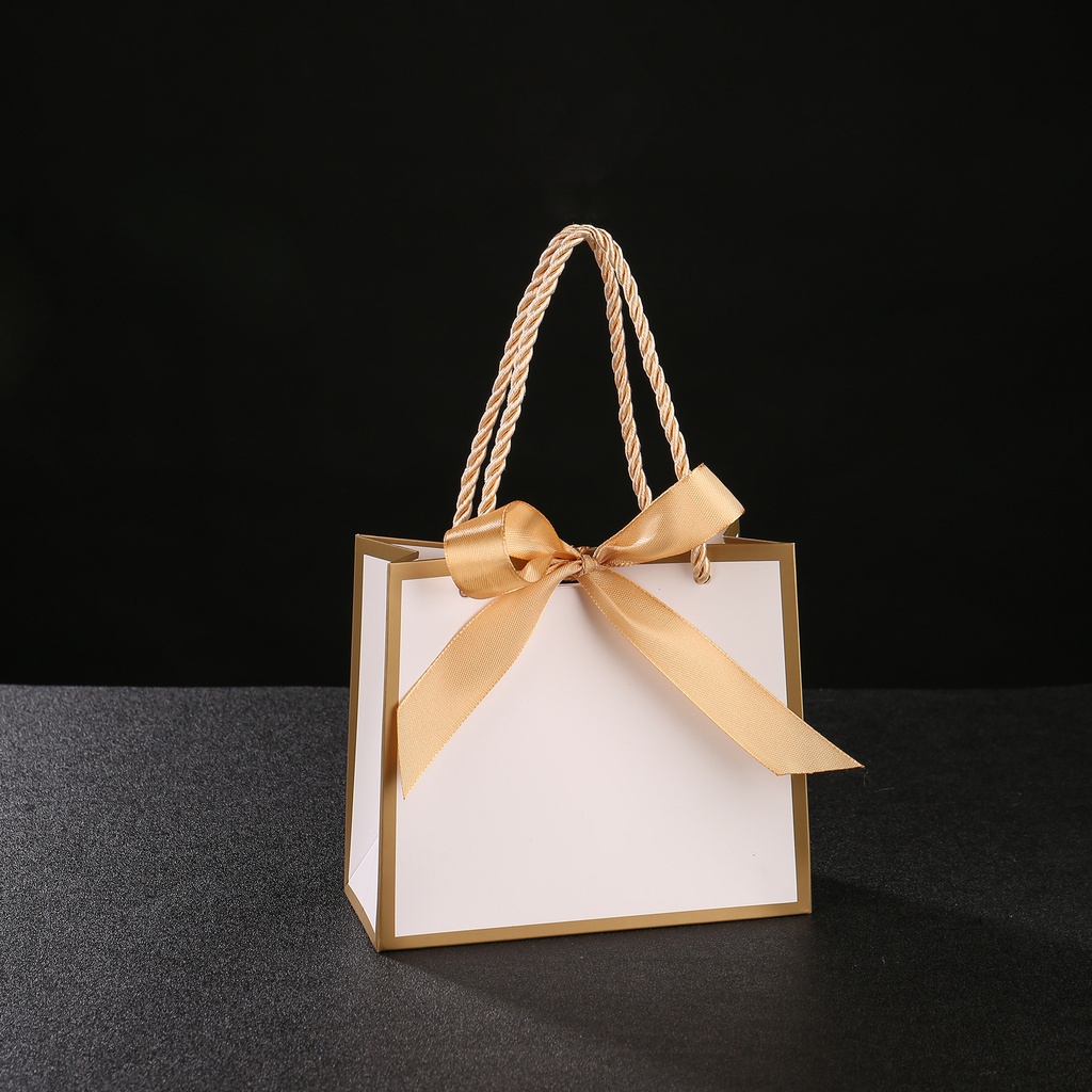 Bolsa de regalo de cartón con lazo blanco 14X6X12cm